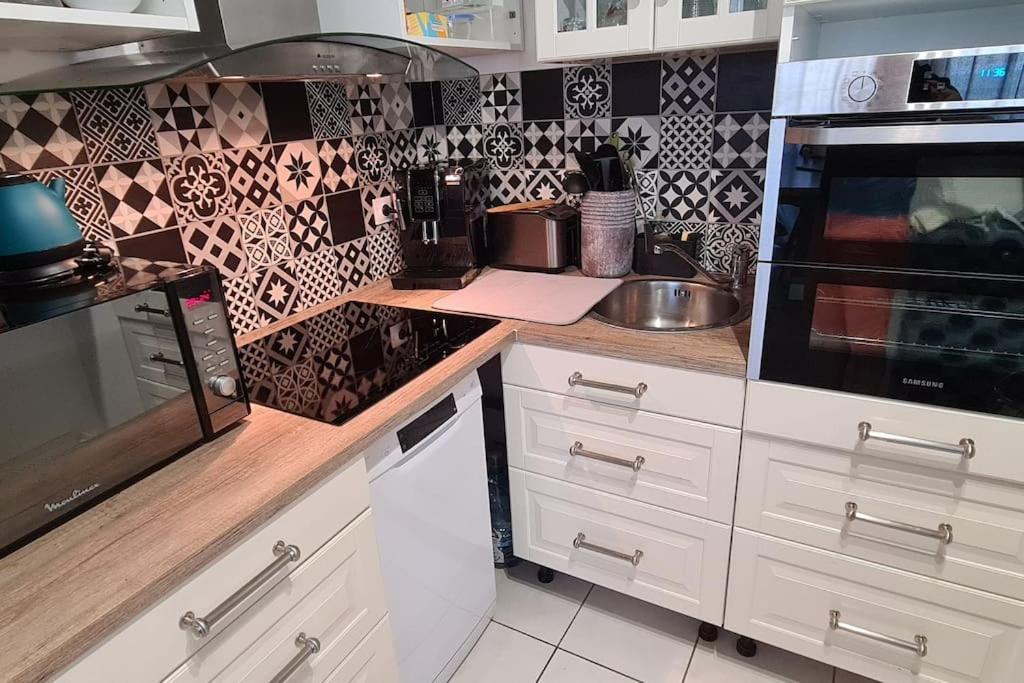 Charmant Logement Avec Jacuzzi Mantes-la-Jolie Kültér fotó